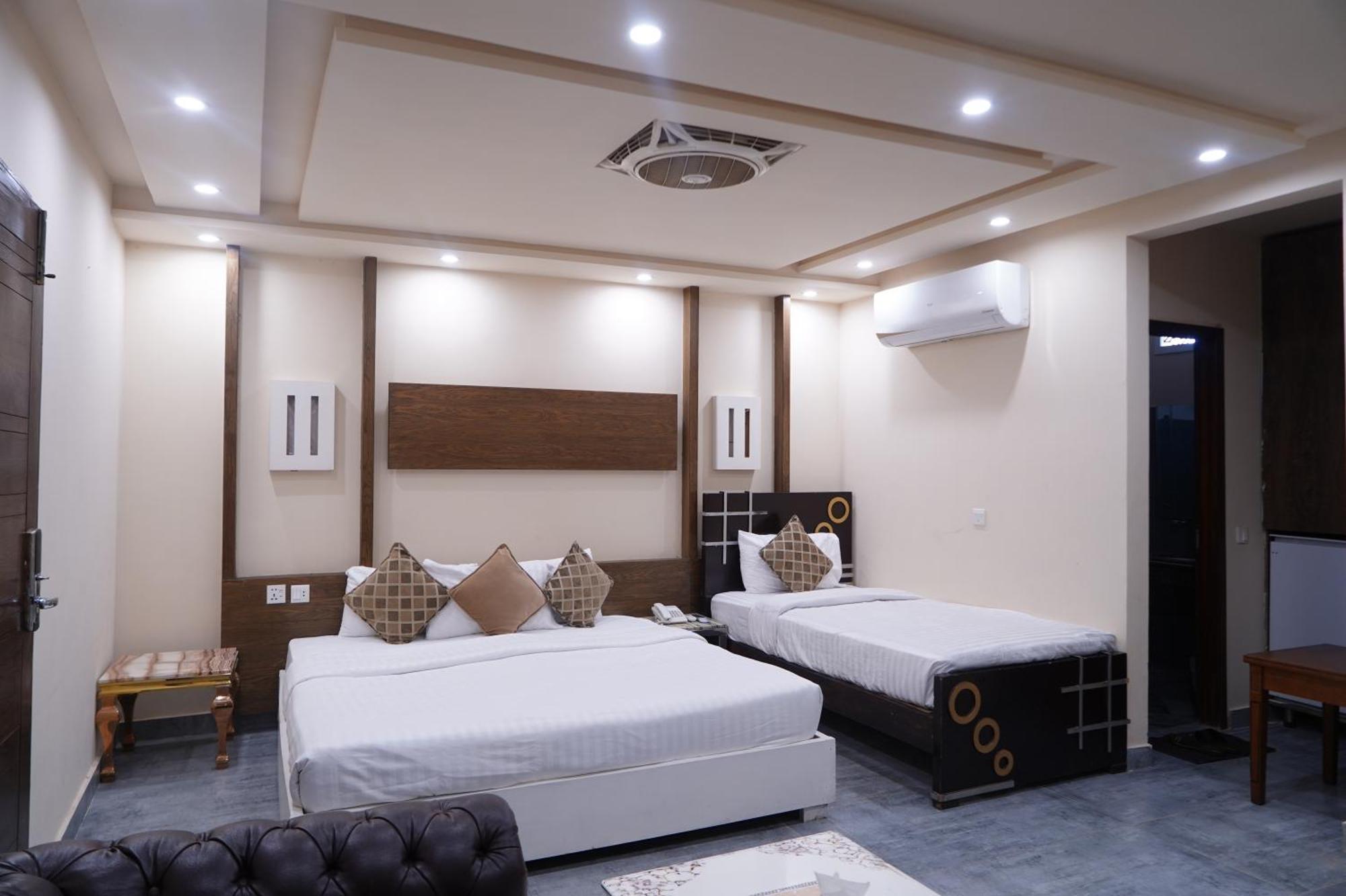 Hotel Avalon Suites Мултан Экстерьер фото